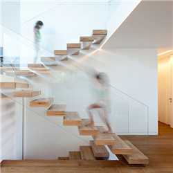 Modern stair with glass railings wooden step floating staircase