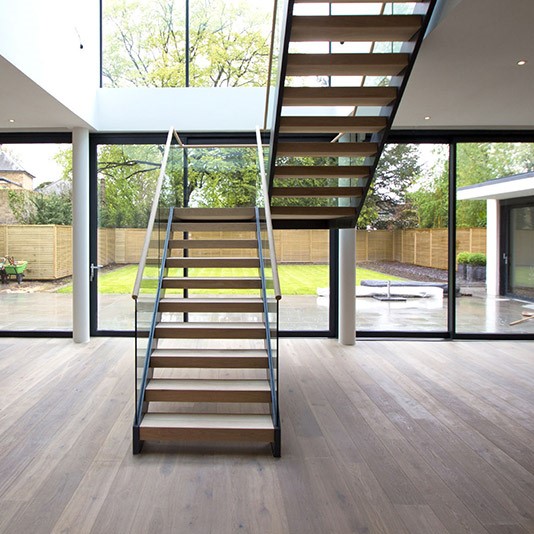 U shaped double beams straight staircase indoor  with glass railing