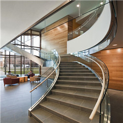 Australia Style Wood Curved Staircase with Wrought Iron Balustrade